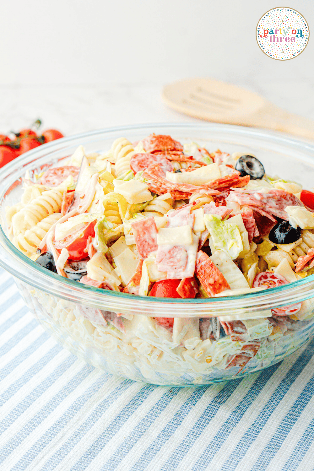 The Italian grinder salad after it has been tossed with dressing.