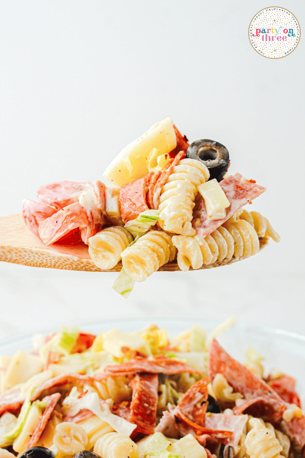 A spoonful of grinder pasta salad.