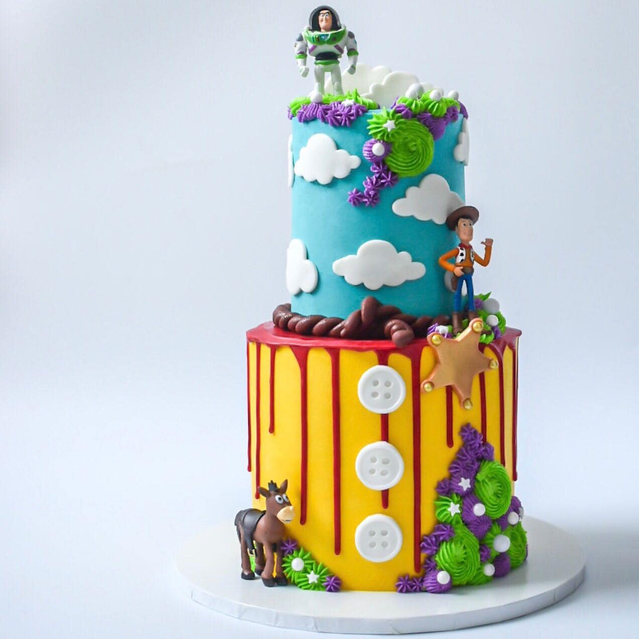 Colorful Tiered Toy Story Cake