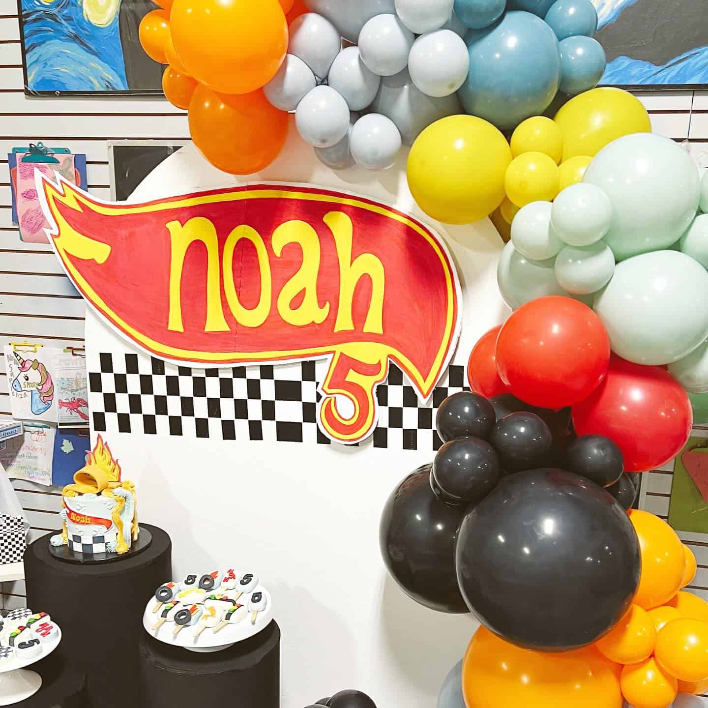 Checkered Backdrop with Custom Hot Wheels Name Sign