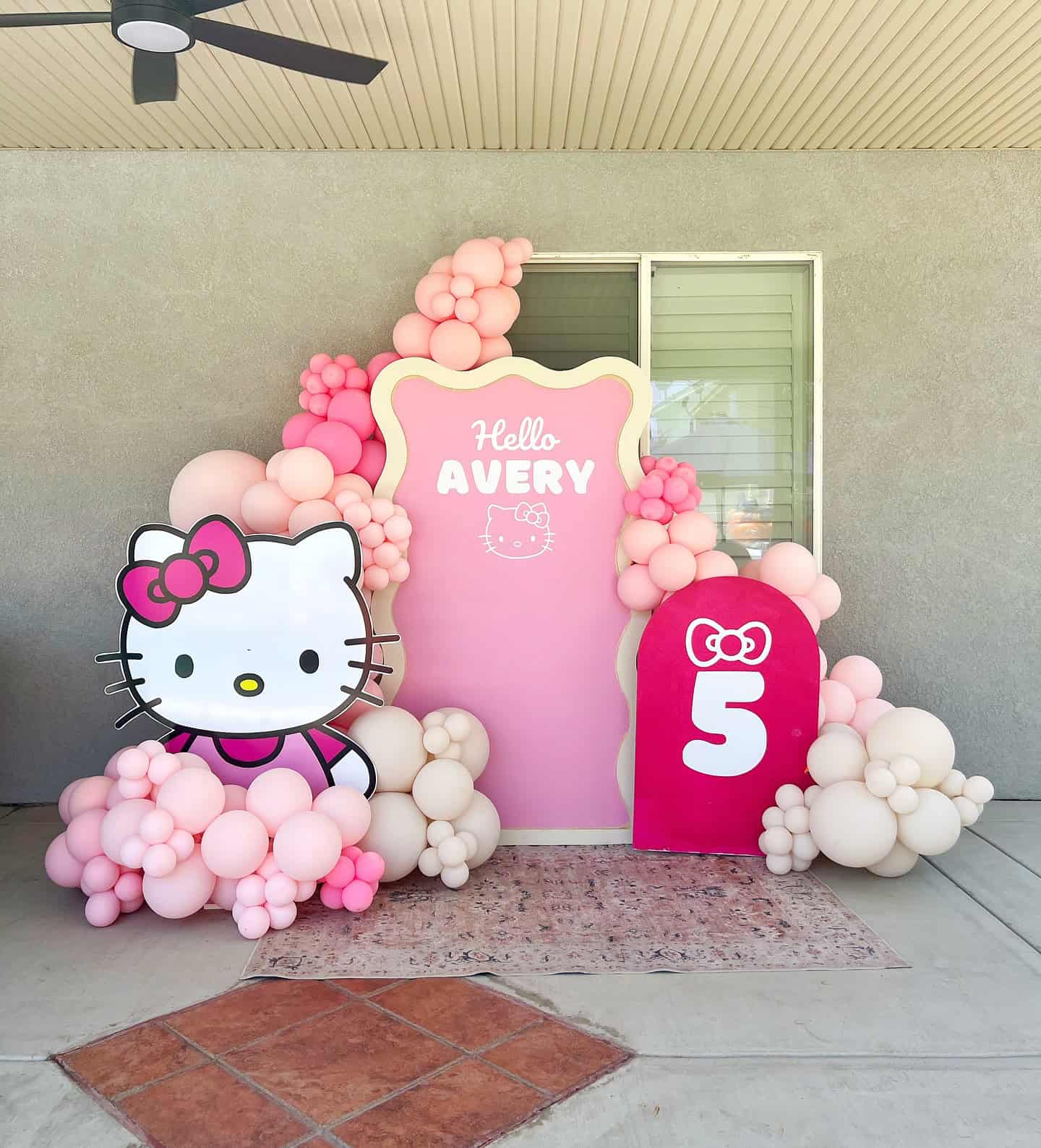 Hello Kitty Backdrop With Number Five Sign