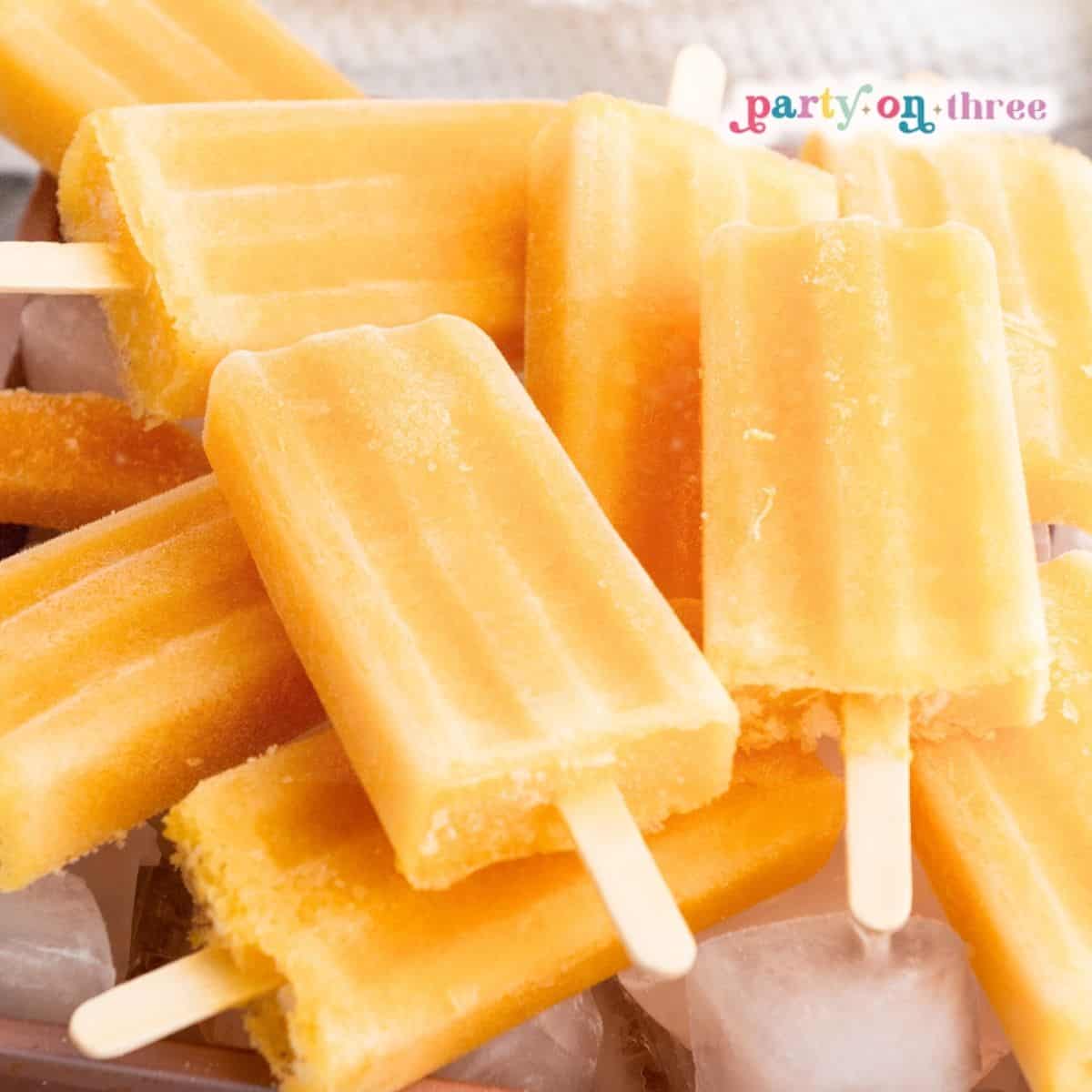 The *Best* Homemade Boozy Peach Popsicles