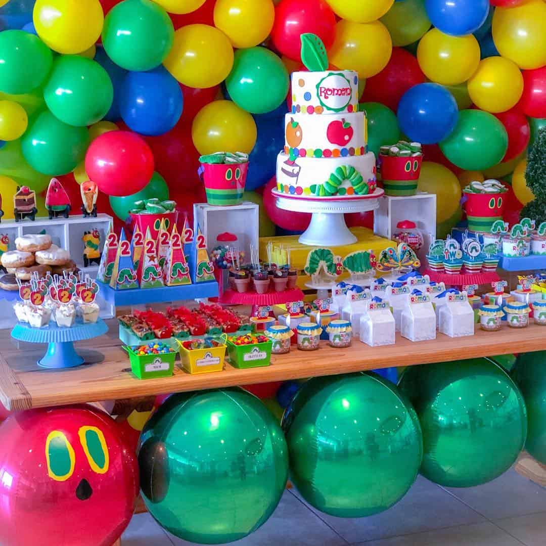 Colorful Balloon Wall Dessert Table with Caterpillar Cake
