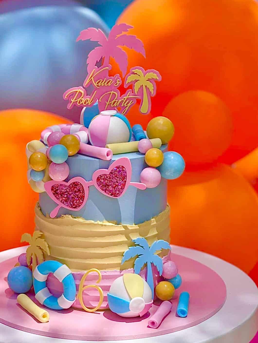 Tropical Pool Party Cake with Beach Balls and Palm Trees