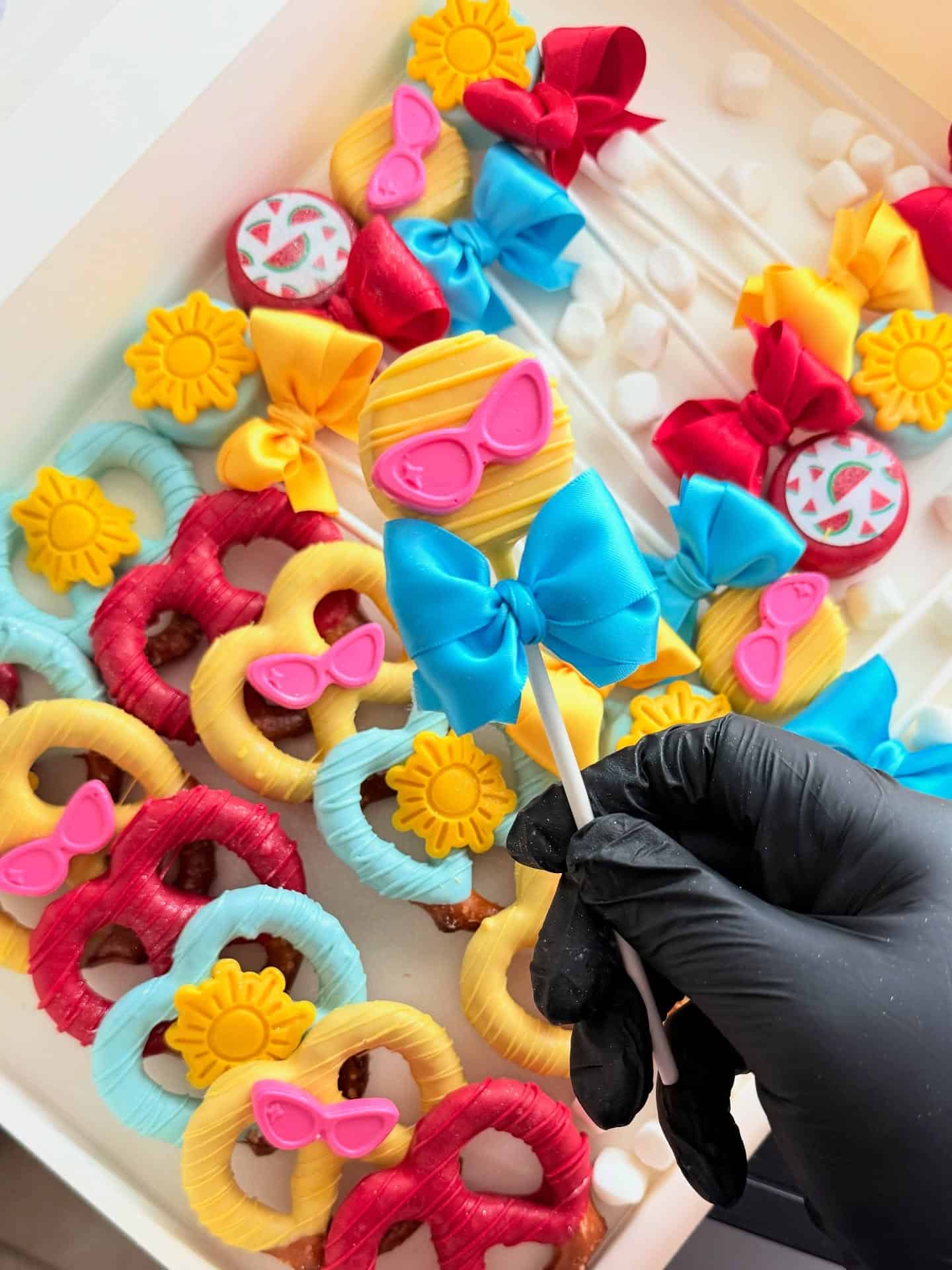 Summer Themed Pretzel Pool Floaties and Lollipop Cake Toppers