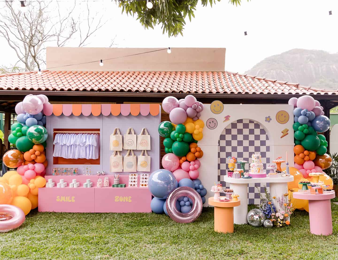 Retro Smiley Face Pool Party Balloon and Dessert Setup