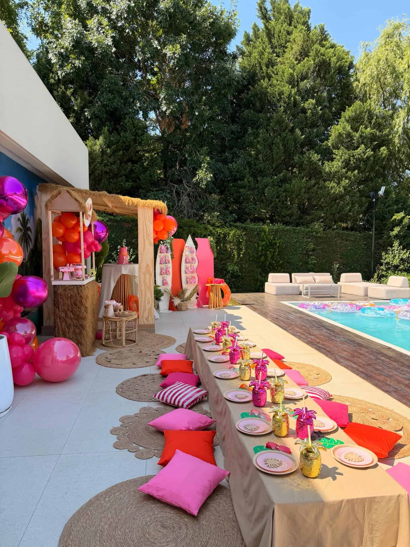 Tropical Tiki Bar Pool Party Setup with Pineapple Balloons