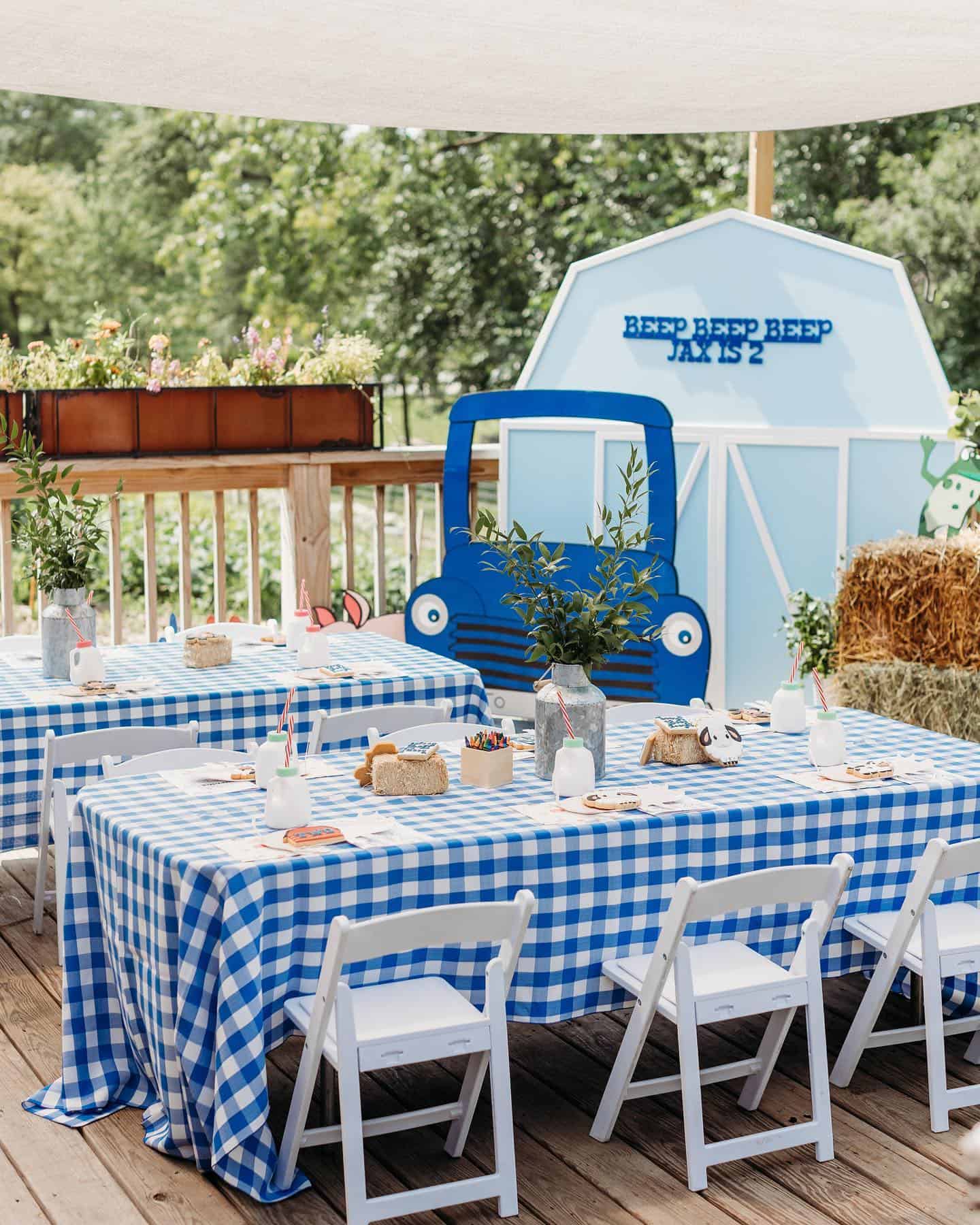 Little Blue Truck Birthday Party Setup with Barn Backdrop