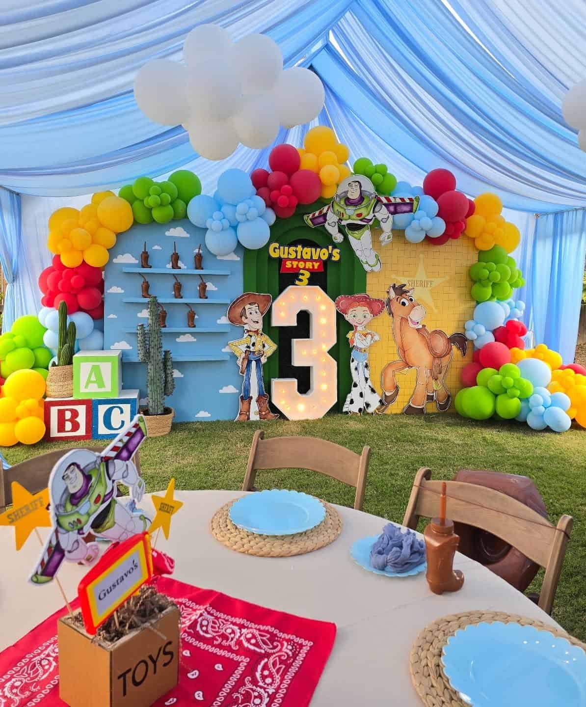 Toy Story Rainbow Balloon Arch Birthday Party Setup