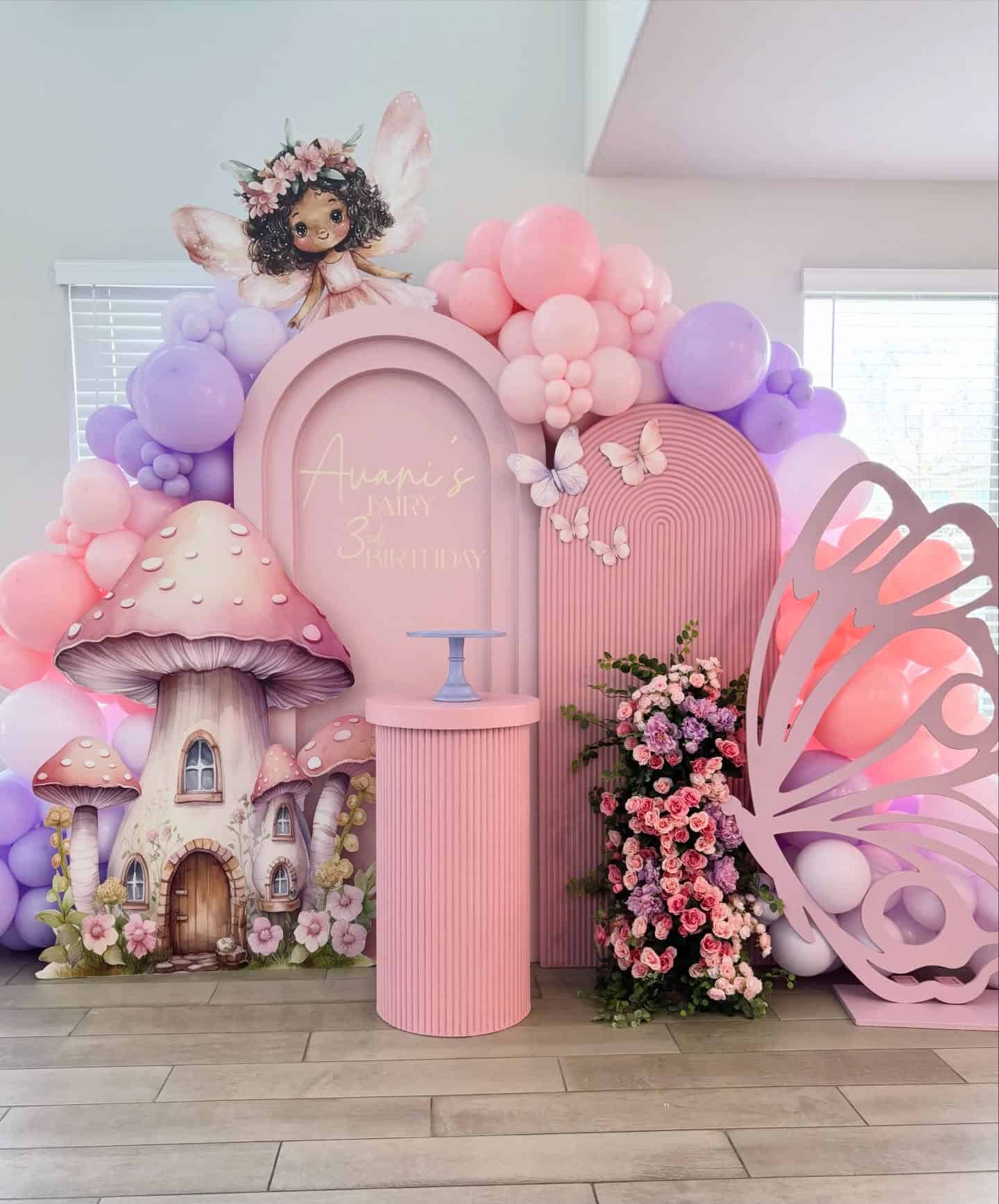 Whimsical Fairy Themed Balloon and Backdrop Setup