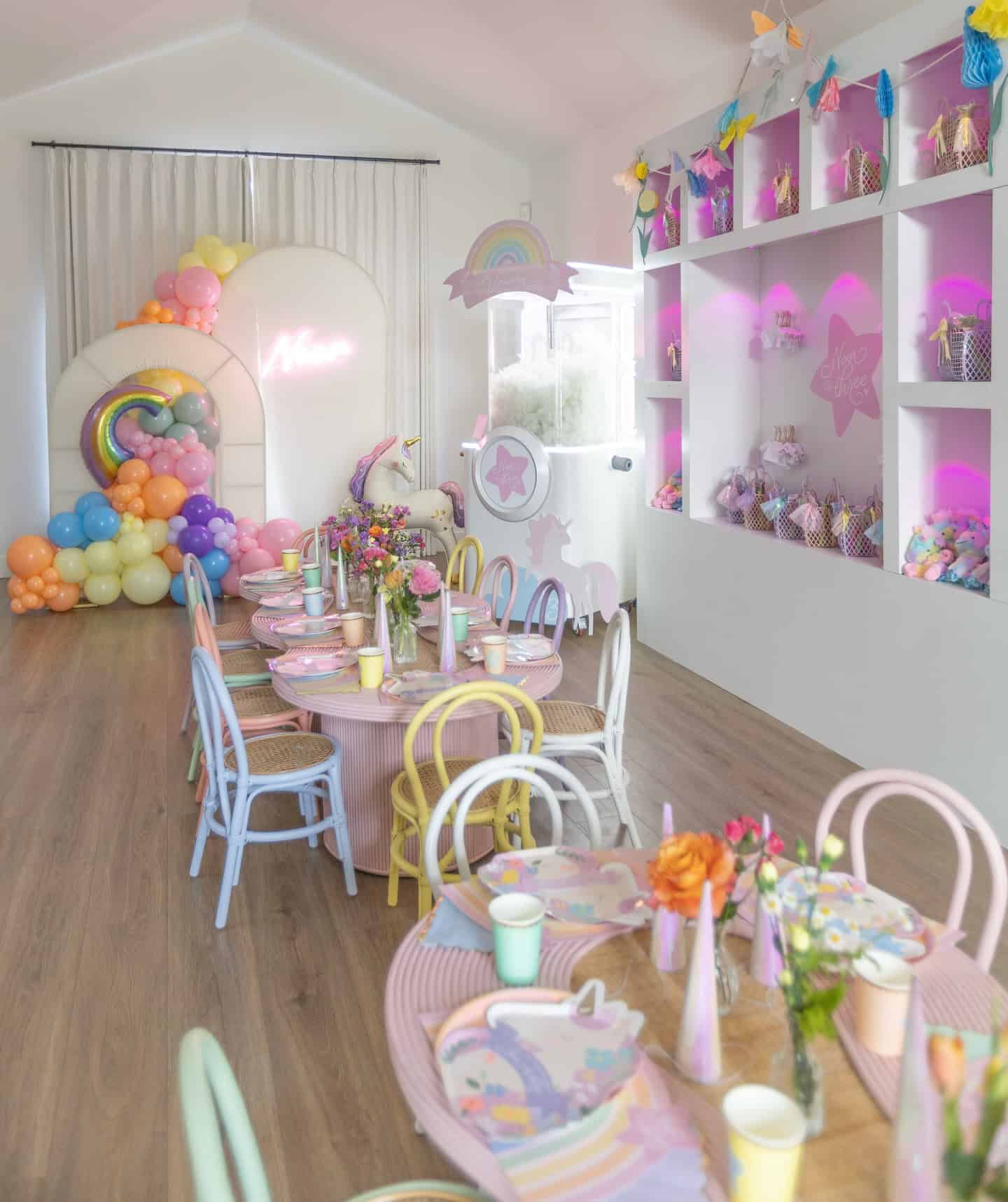 Rainbow Unicorn Party Setup with Pastel Balloon Arch