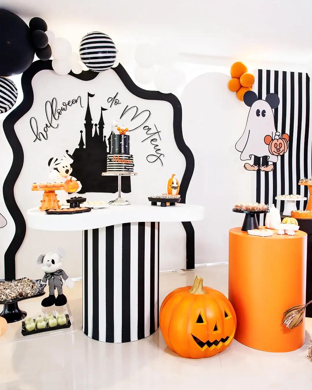 Black and Orange Mickey Themed Dessert Table Setup