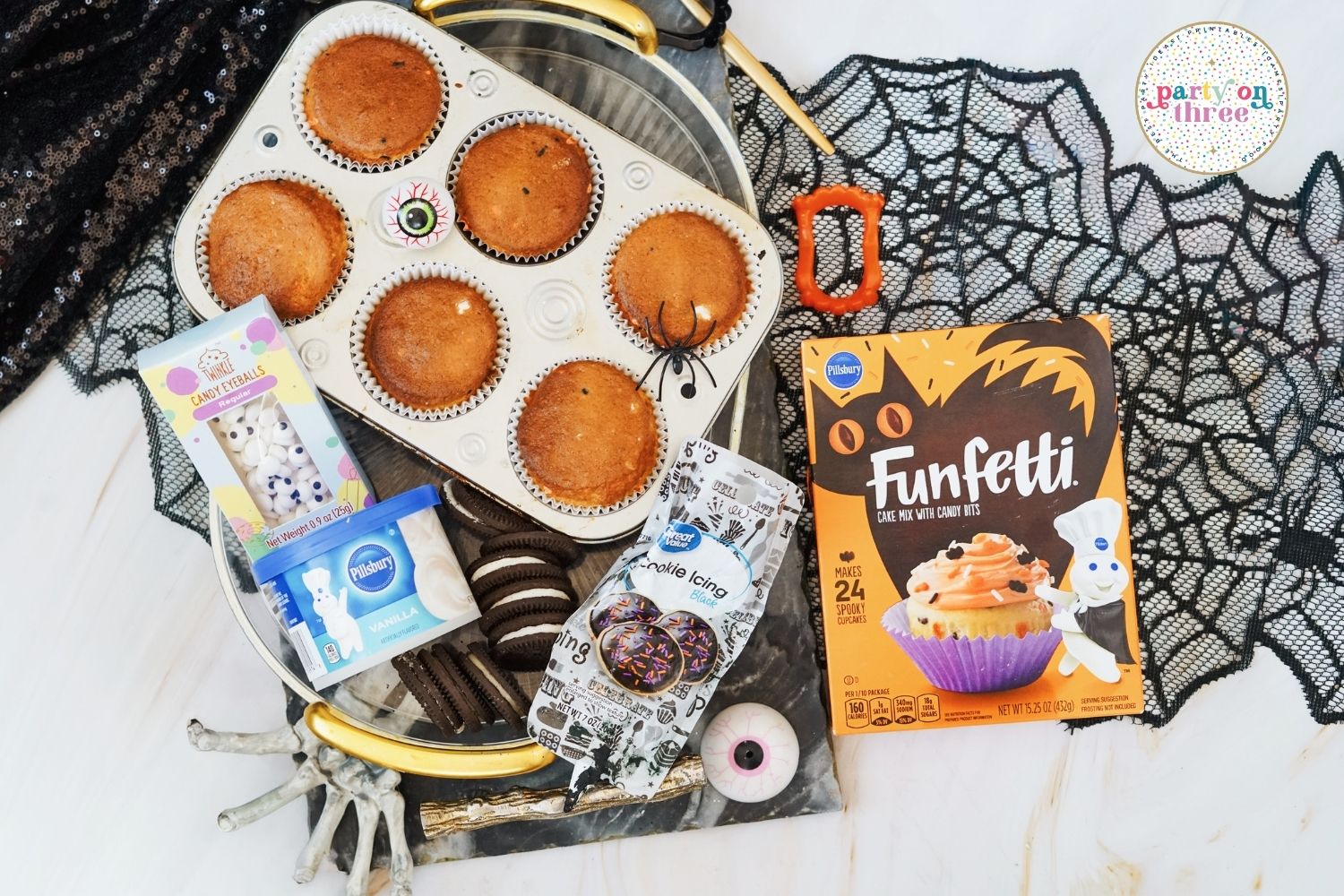Ingredients for Halloween spider cupcakes.