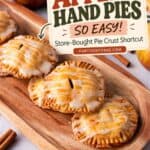 Apple hand pies on a wooden tray labeled easy with store-bought pie crust shortcut text