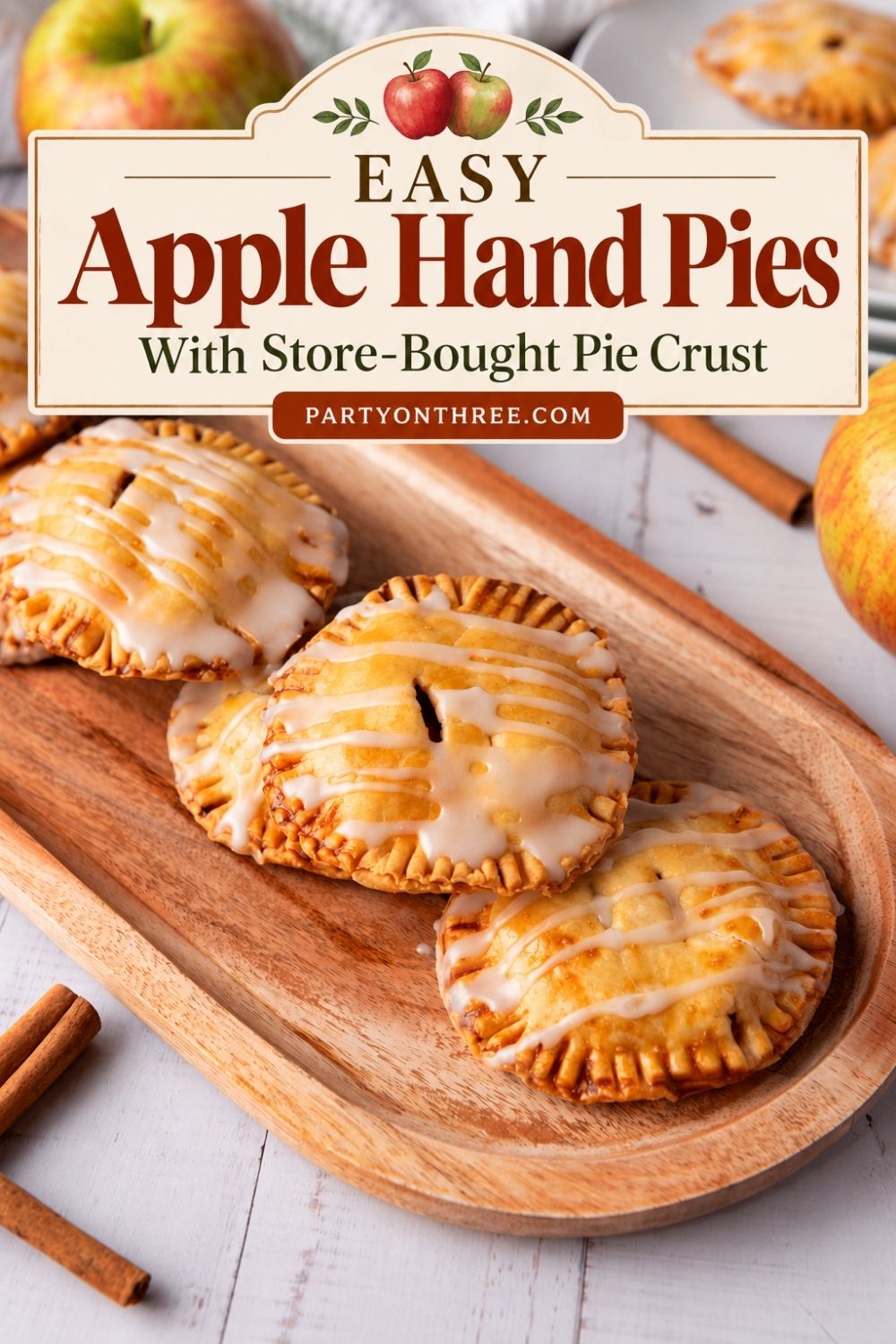 Wooden tray of glazed apple hand pies labeled easy with store-bought pie crust