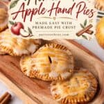 Homemade apple hand pies text overlay on a tray of glazed pies made with premade crust