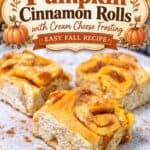 Pumpkin cinnamon rolls on a plate with cinnamon stick and fall baking text overlay