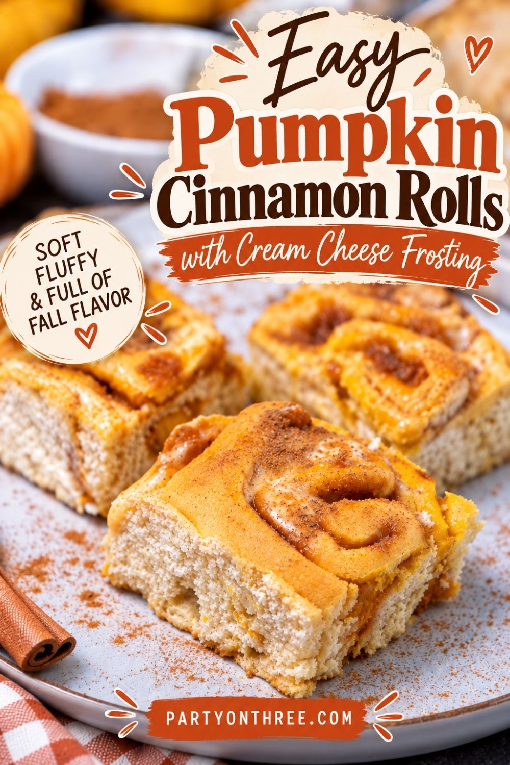 Plated pumpkin cinnamon rolls with pumpkin and cinnamon stick graphics on overlay