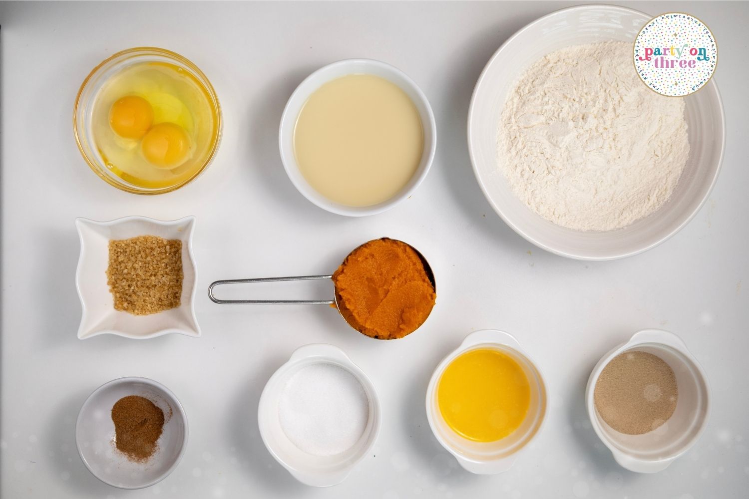 Ingredients needed to make homemade pumpkin cinnamon rolls.