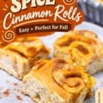 Close up of a plated pumpkin cinnamon roll with the Party on Three logo overlay
