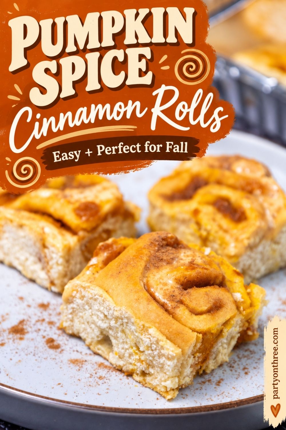 Close up of a plated pumpkin cinnamon roll