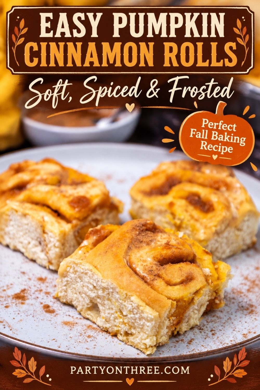Three baked pumpkin cinnamon rolls on a plate with fall flavor text badge