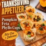Pumpkin Feta Phyllo Cups appetizer on wood board with spinach and pumpkin, Thanksgiving text overlay