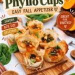 Pumpkin Feta Phyllo Cups on board with savory bite-size delicious labels and party badge