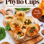 Pumpkin Feta Phyllo Cups on cutting board, fall entertaining Thanksgiving appetizer text overlay