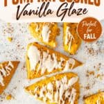 Glazed pumpkin scones on a speckled surface with text reading easy pumpkin scones with vanilla glaze