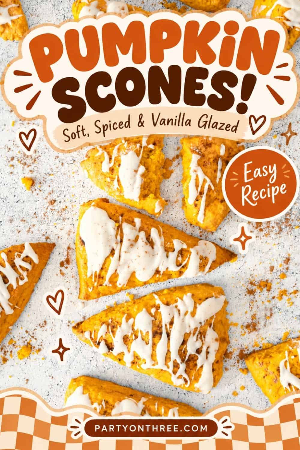 Pumpkin spice scones drizzled with vanilla glaze on a speckled surface, styled for fall baking