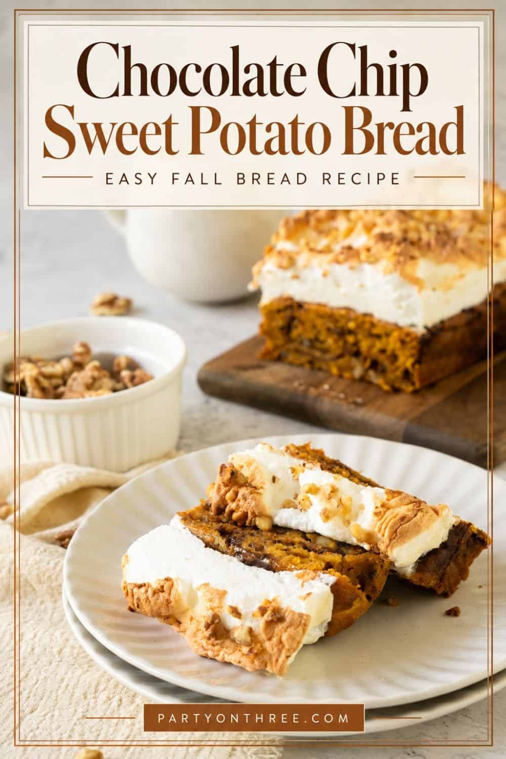 Two slices of sweet potato bread with toasted meringue on a white plate before