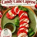 Caprese Candy Cane appetizer with tomato and mozzarella slices, basil, and balsamic drizzle on a green plate
