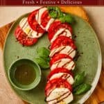 Caprese Candy Cane appetizer on a green plate with balsamic glaze, basil, and dipping sauce.