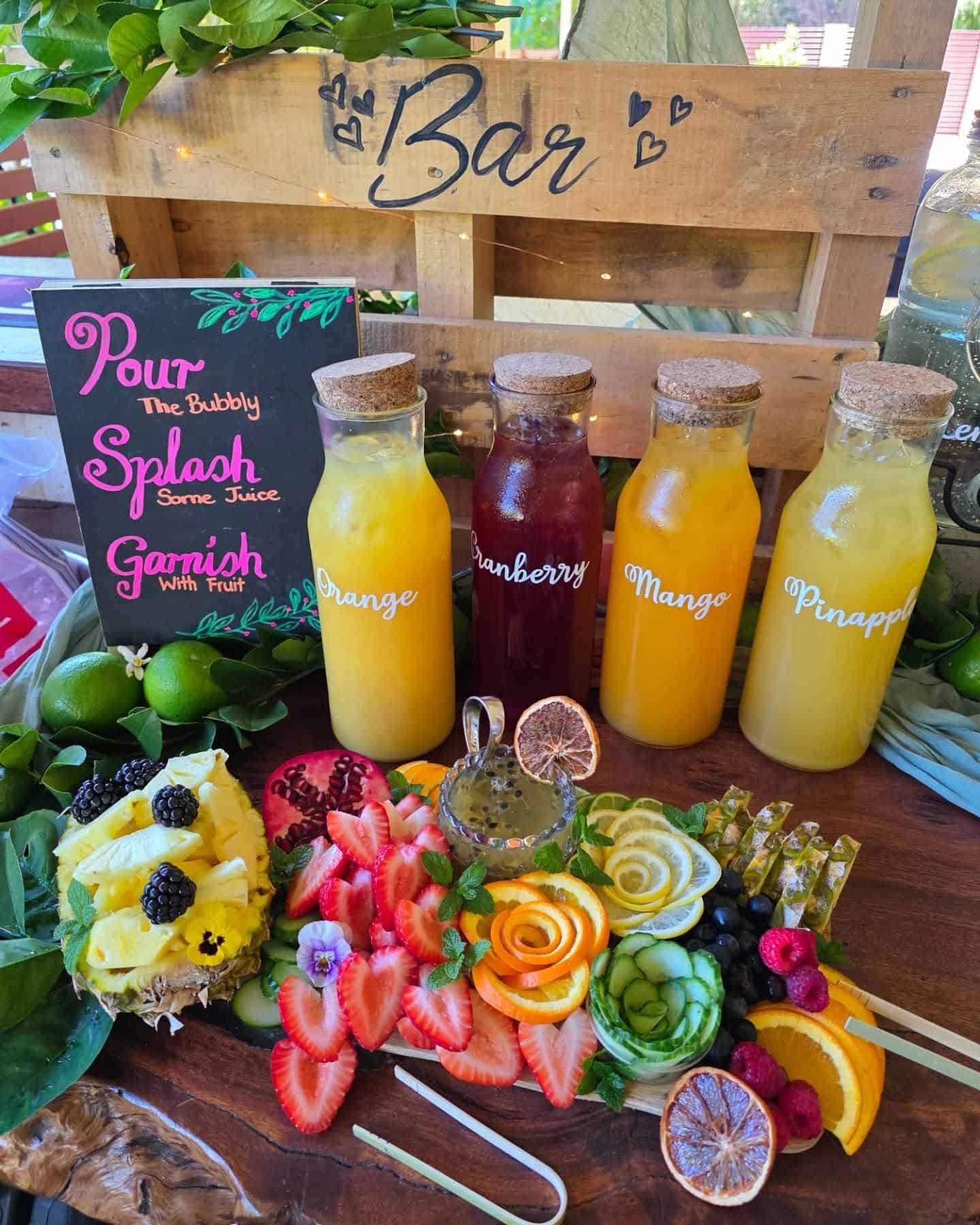 Carved Fruit Board Mimosa Bar With Garnish Sign