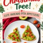 Christmas tree shaped avocado pita appetizers topped with diced tomatoes on a white plate