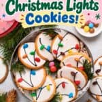 Christmas Light Cookies in a tin, iced with candy bulbs and piped black wire designs