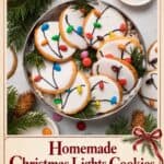 Christmas Light Cookies on a tin, white iced sugar cookies topped with candy lights and icing wire designs