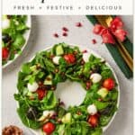 Christmas Wreath Salad (Easy Christmas Caprese Salad) shaped like a wreath with mozzarella, tomatoes, and pomegranate seeds