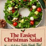 Christmas Wreath Salad (Easy Christmas Caprese Salad) on a white plate with mozzarella, tomatoes, and pomegranate seeds