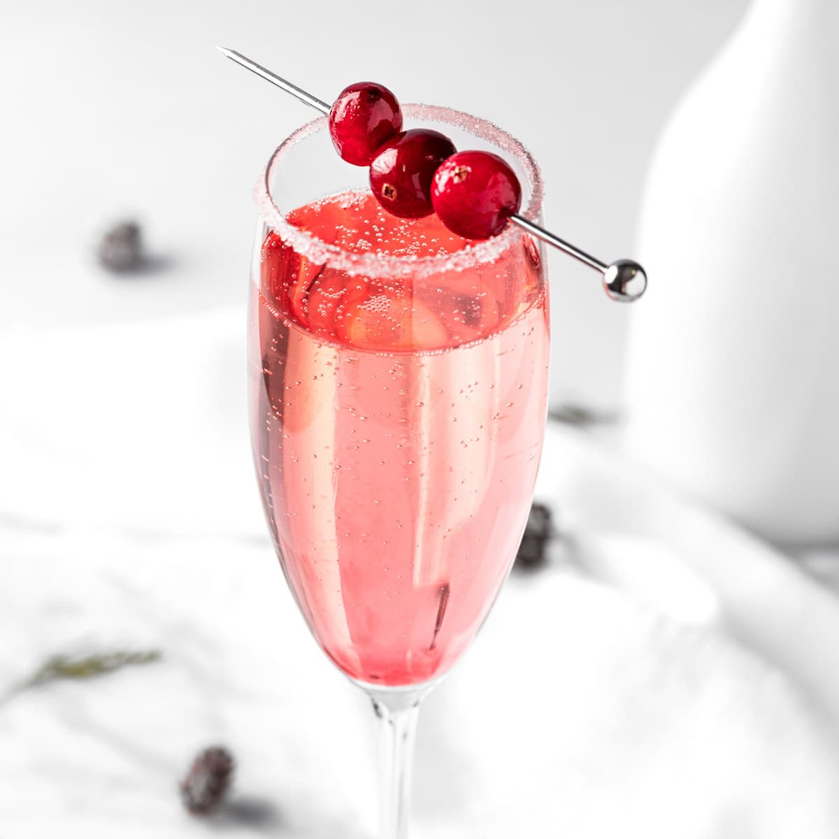 Cranberry Mimosa (Poinsettia Cocktail) - The Littlest Crumb