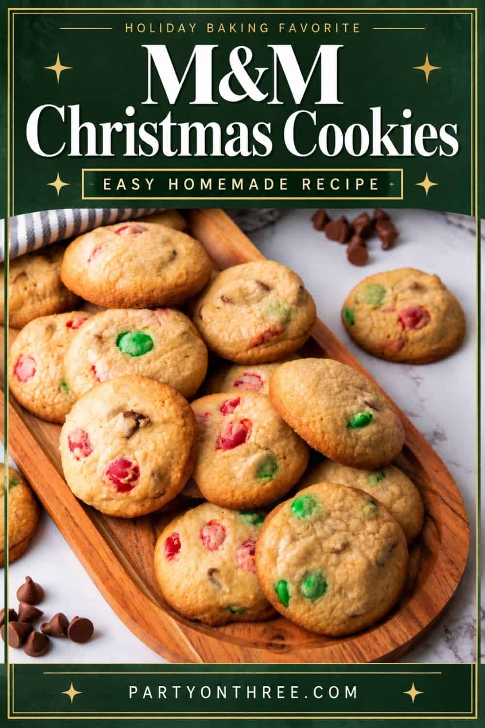 Easy Christmas cookies with red and green M&M's and chocolate chips piled on a wooden serving board