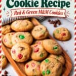Easy Christmas cookies with red and green M&M candies piled on a wooden tray