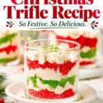 Mini Christmas Trifle Cups layered with red and green cake crumbs and whipped cream in glass cups