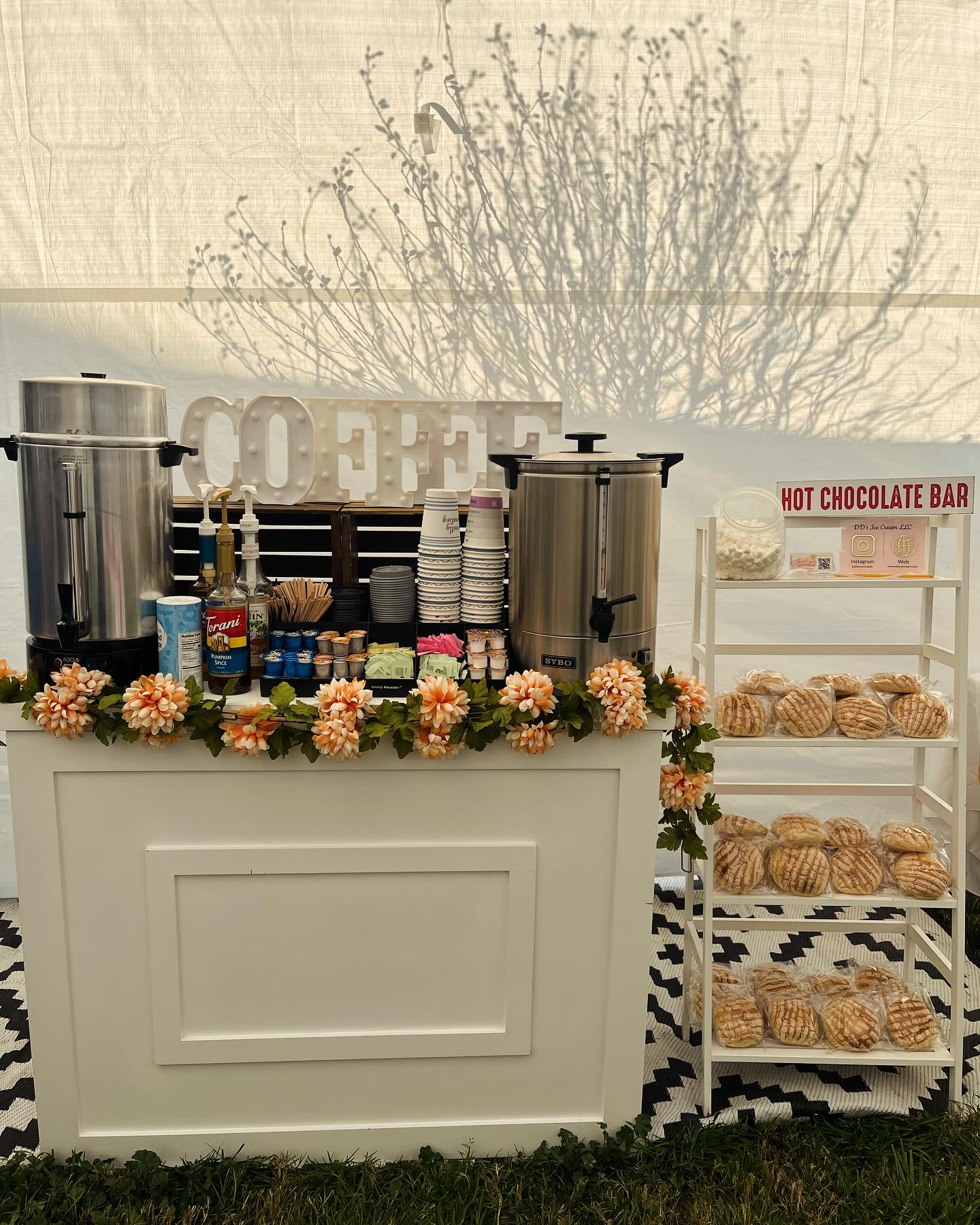 Pan Dulce Rack Beside a Coffee and Cocoa Cart