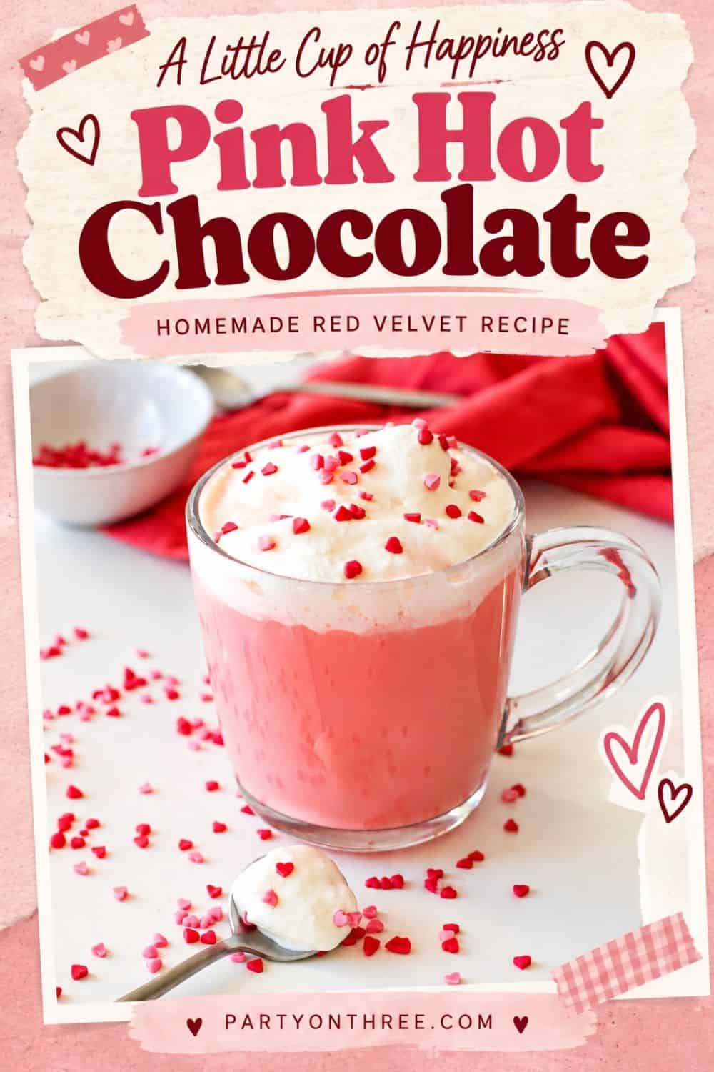Homemade red velvet hot chocolate topped with whipped cream and heart sprinkles