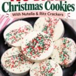 White chocolate-dipped Ritz Cracker Christmas Cookies with red, green and white sprinkles on a black plate