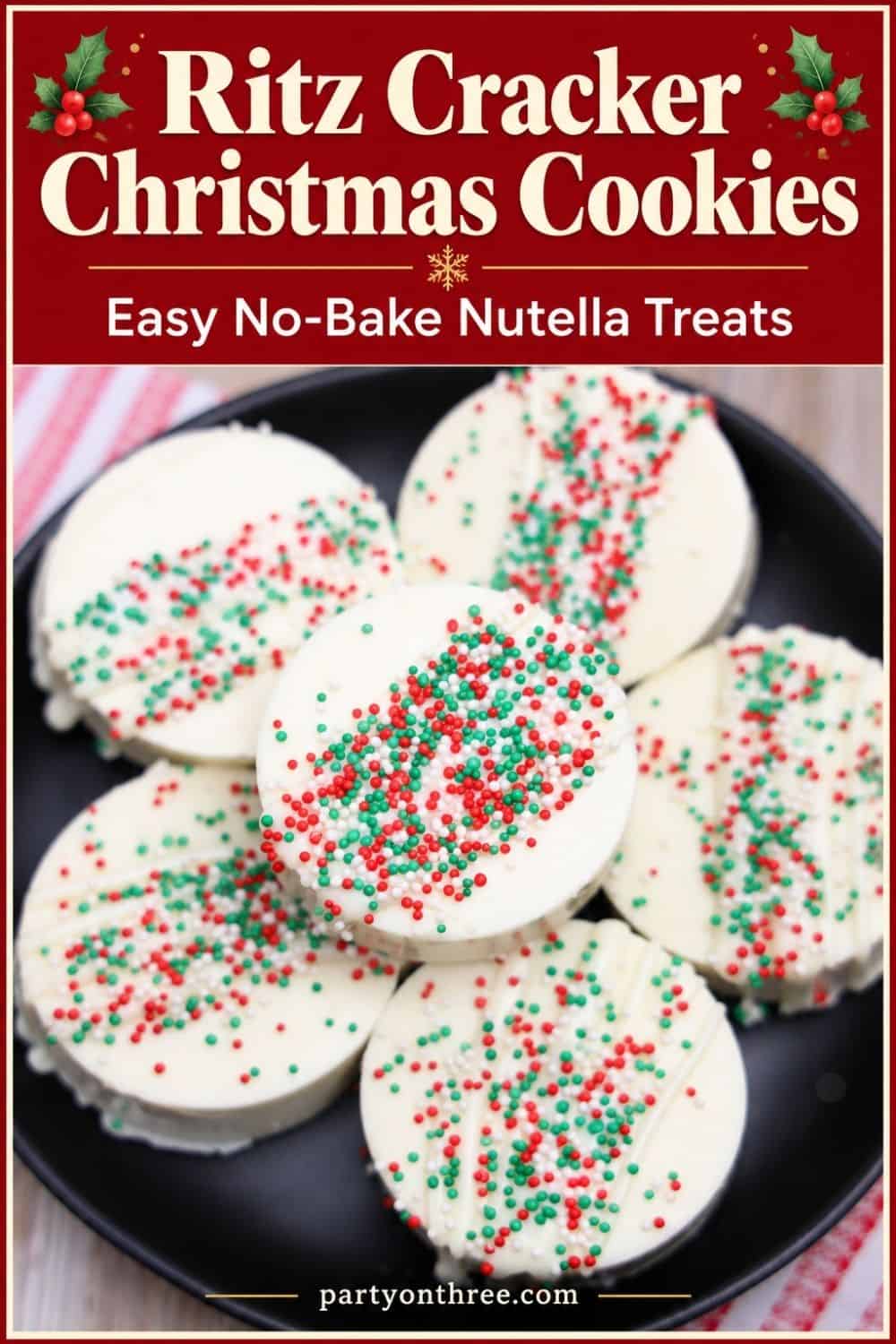Ritz Cracker Christmas Cookies coated in white chocolate and topped with red and green sprinkles on a black plate
