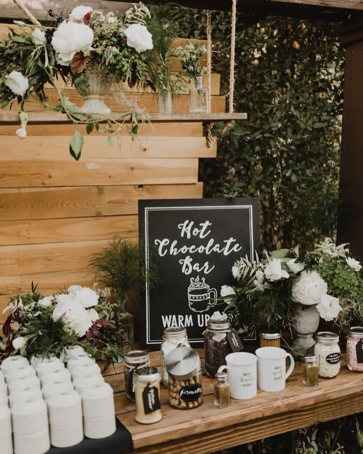 Suspended Floral Shelf Above a Hot Chocolate Bar Sign